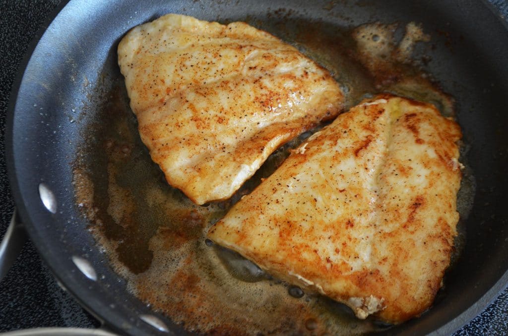 Fish filets in a saute pan