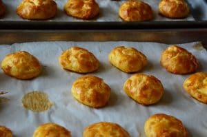 Gougeres cheese puffs on a sheet pan