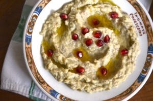 Baba Gannouj on a plate with pomegranate seeds
