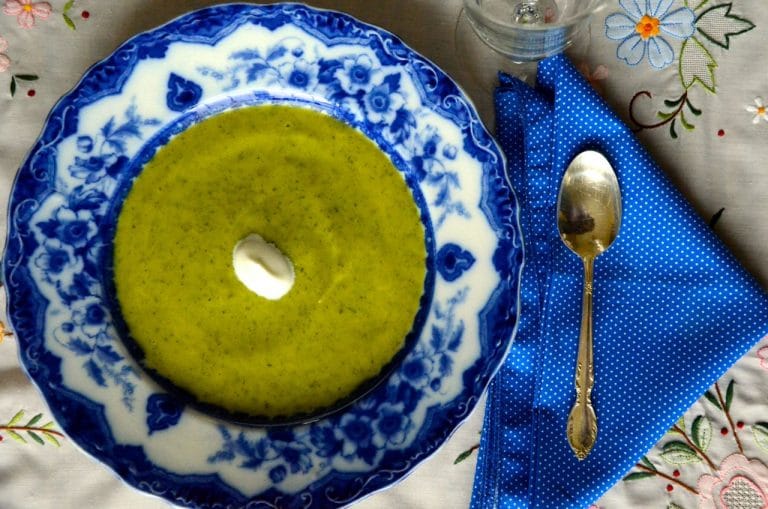 Basil Zucchini soup in a blue and white bowl
