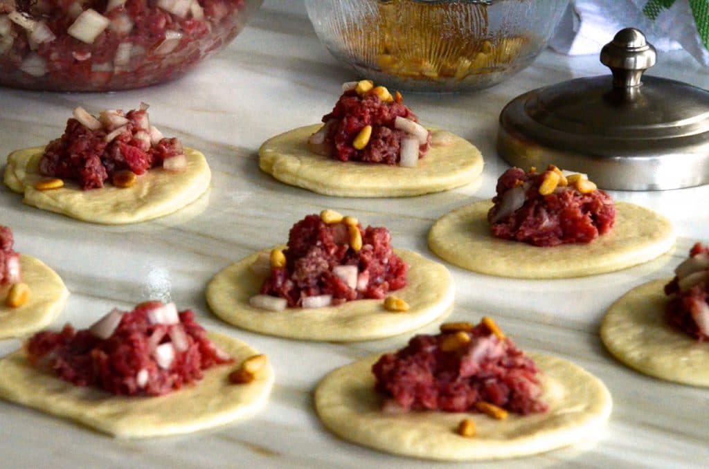 Dough with meat circles, Maureen Abood