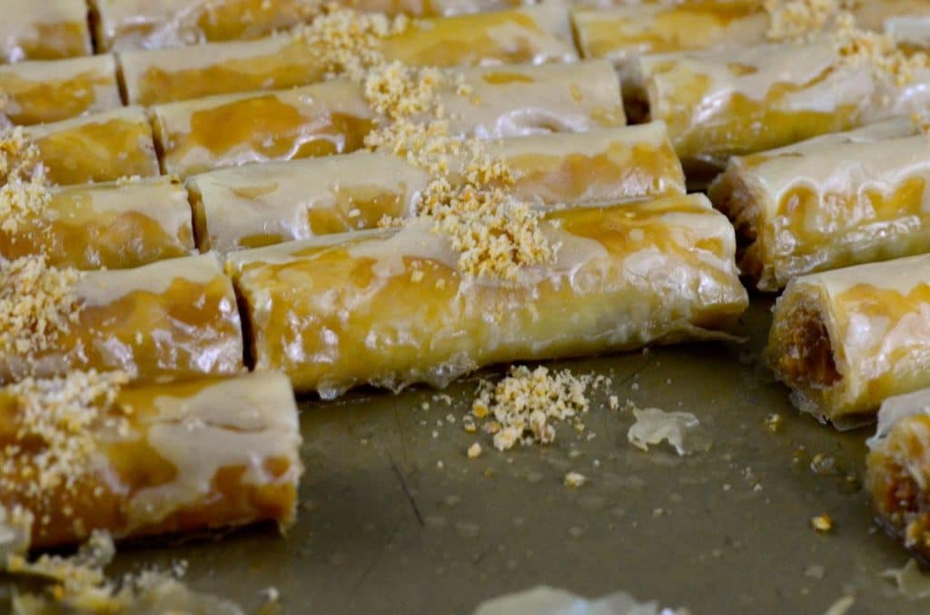 Almond baklawa fingers in a pan, Maureen Abood
