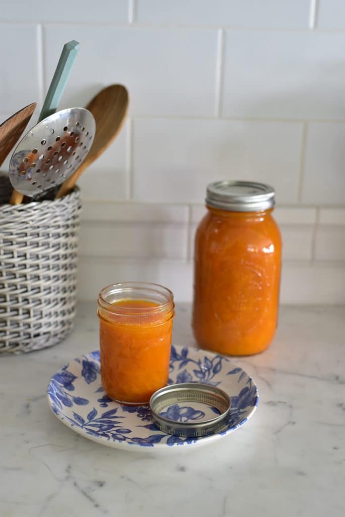 Apricot Jam jars on the counter, Maureen Abood
