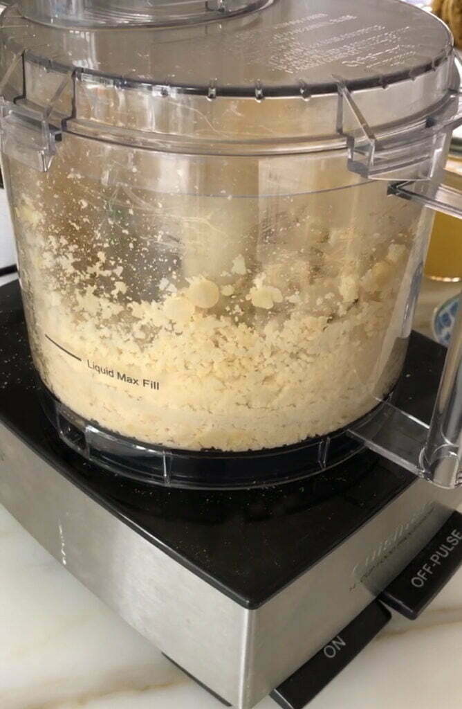 Chickpeas and ingredients in the food processor for hummus