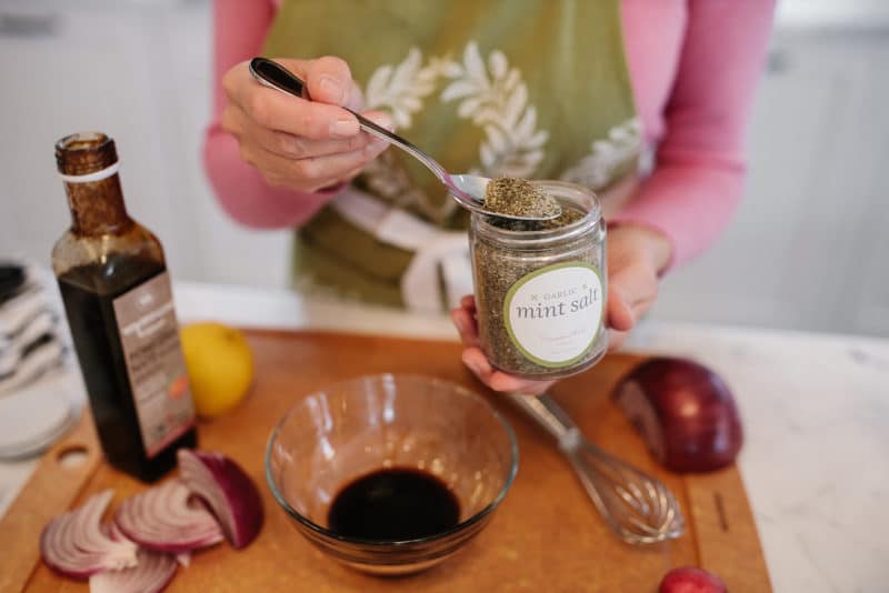 Pomegranate molasses and spices in a bowl for fattoush salad dressing