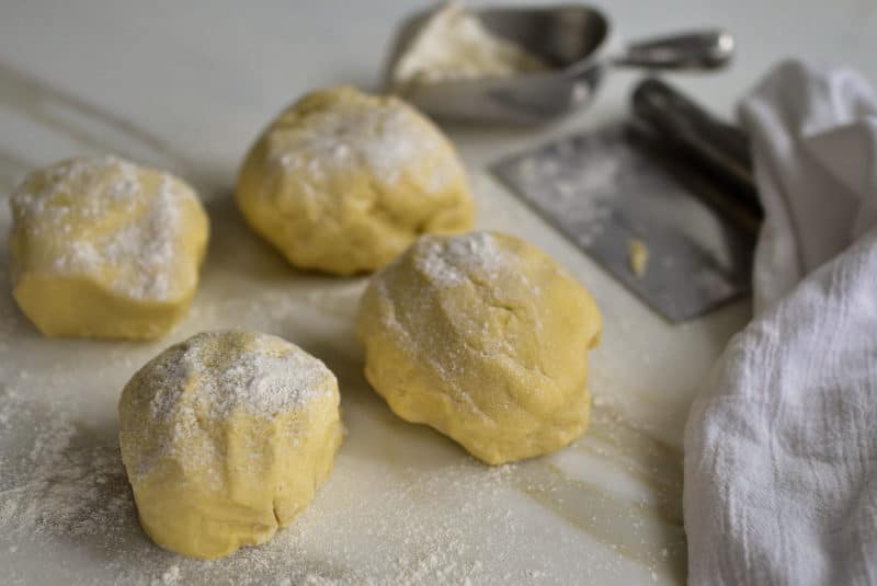 Brioche dough balls dusted with flour, Maureen Abood