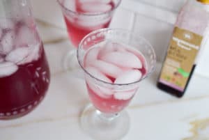 Lebanese Mulberry Syrup spritzer over ice in a beautiful glass, by Maureen Abood