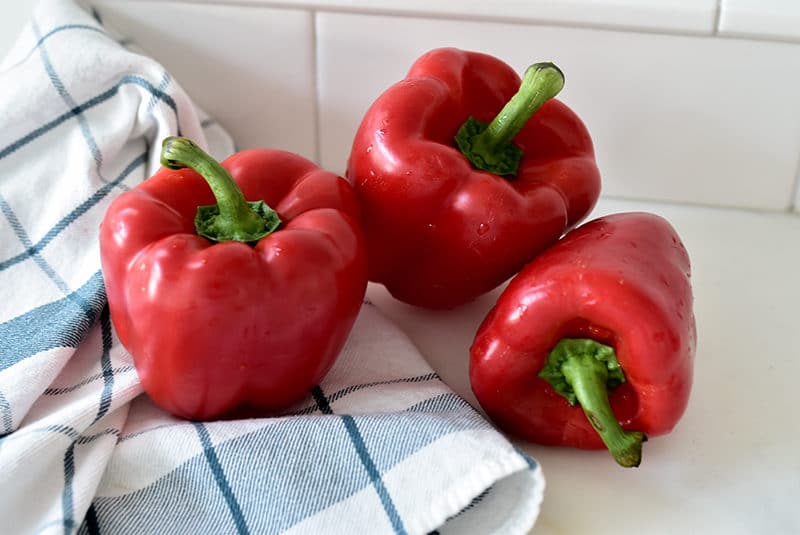 Red bell peppers on the counter