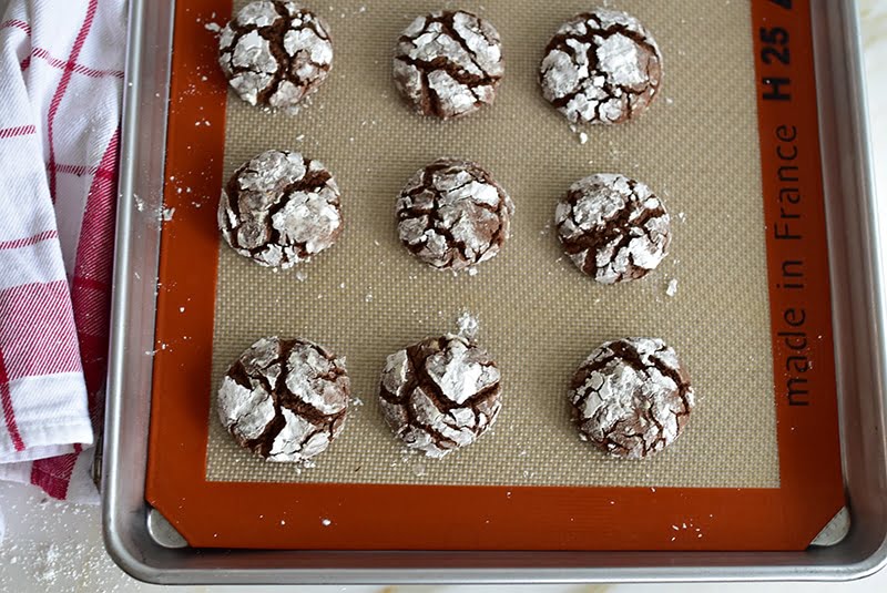 Chocolate crinkle cookies with orange blossom on a silpat