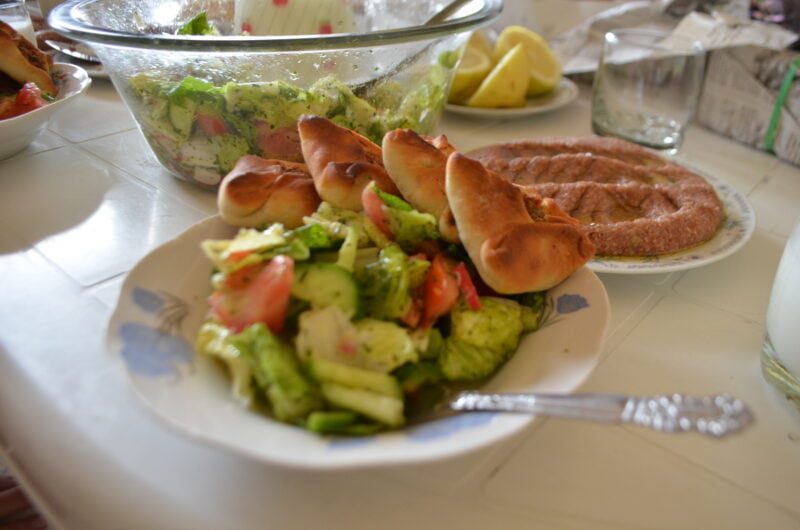 Baalbek sfeha and salad on a plate