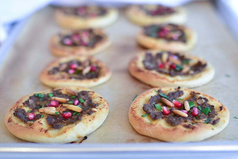 Sfeha with meat and pomegranate seeds