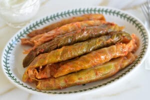 Cabbage rolls with tomato on a platter