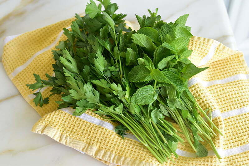 Parsley and mint on a towel