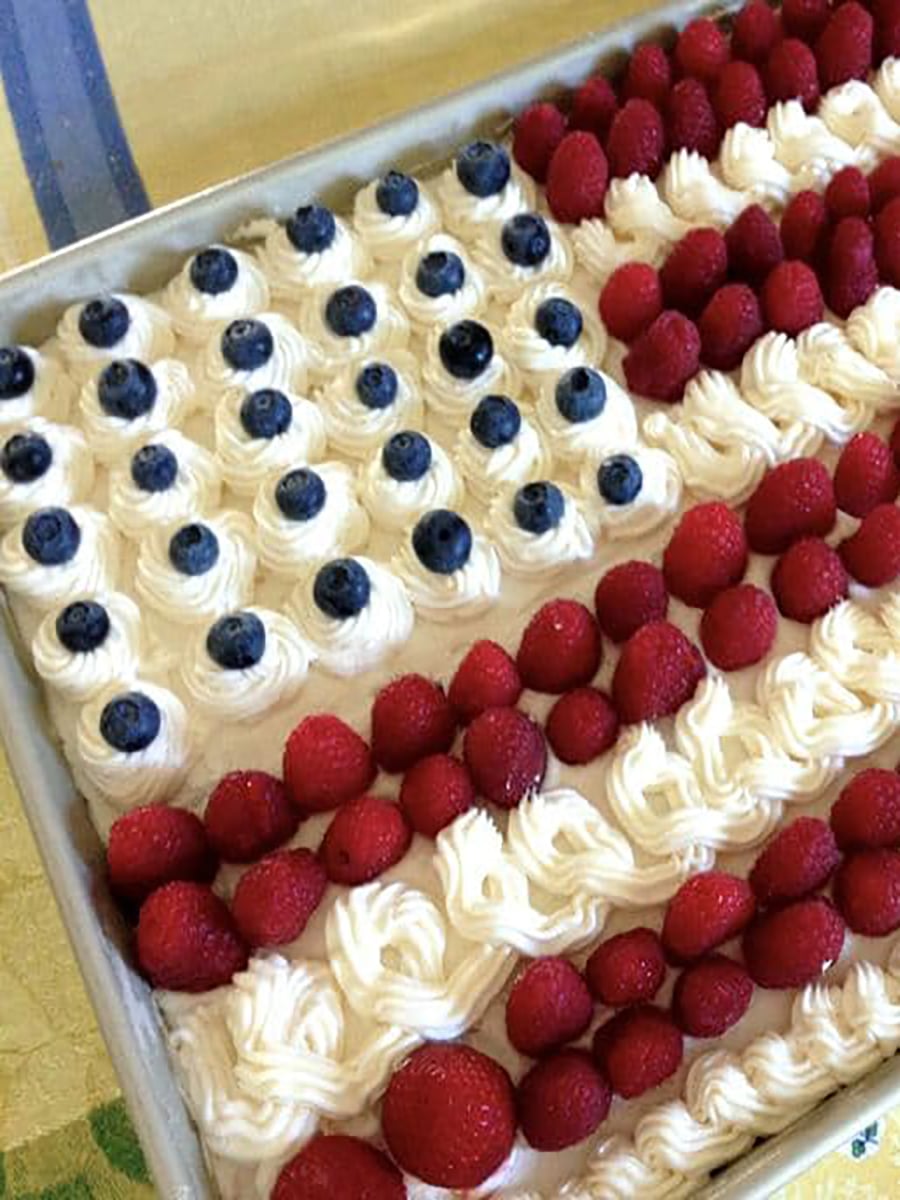 Flag cake with raspberries and blueberries