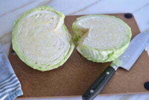 Cabbage cut in half with the core removed