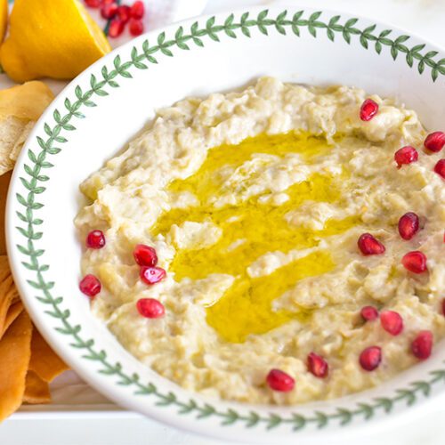 Baba Gannouj in a bowl with pomegranate seeds