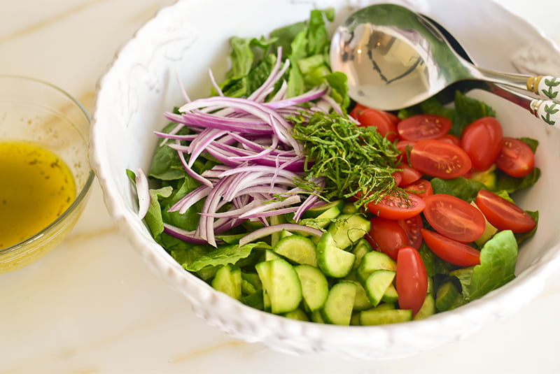 Ingredients for Lebanese Salad (Salata) in a white bowl